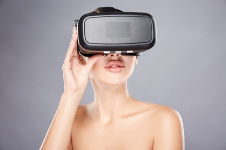 Close up portrait of girl wearing virtual reality glassesの写真素材