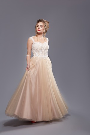 beautiful lady in lush dress and evening makeupの写真素材