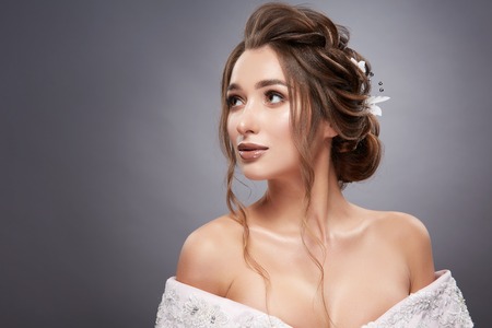 woman with nice make-up and hairstyle looking upの写真素材