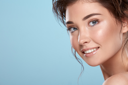 Beautiful woman with naked shouldersの写真素材