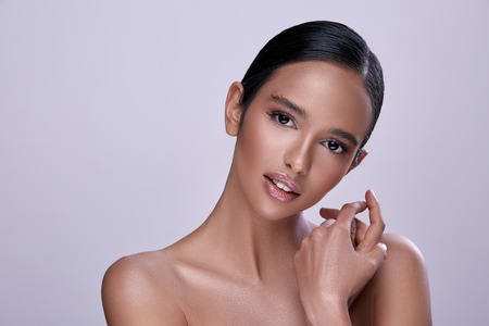 Girl posing with naked shouldersの写真素材