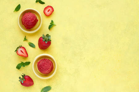 Strawberry ice cream sorbet with fresh berry. Top view with copy spaceの写真素材