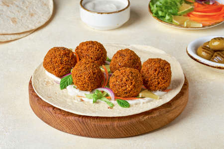 Chickpeas falafel prepare to make wrap sandwich. Closeupの写真素材