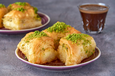 Sweets arabic dessert kunefe, kunafa, knafeh with pistachio and cheese