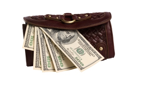 Purse with cash isolated over white background