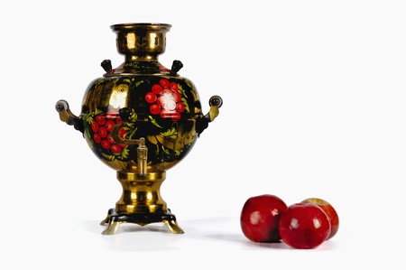 Traditional Russian Samovar and three red apples on the white backgroundの写真素材