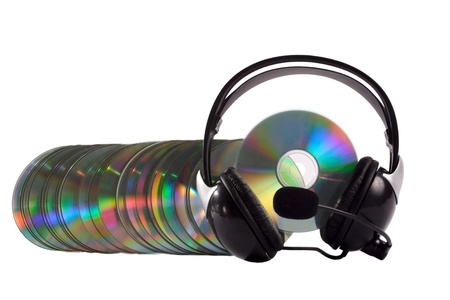 Headphone and cd collection as a caterpillar isolated on white background