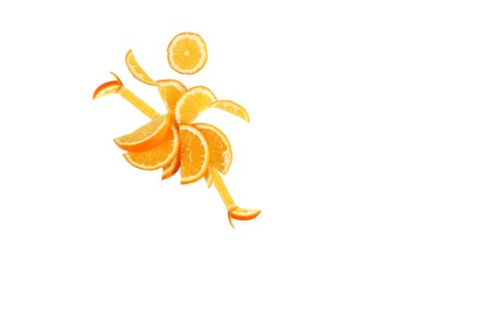 Healthy eating. Funny dancing little woman made of the orange slices の写真素材