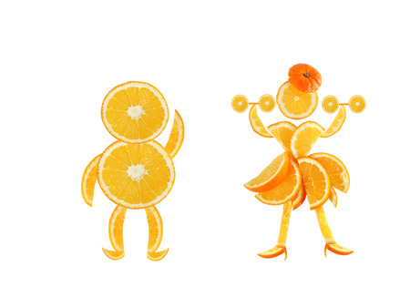 Healthy eating. Funny little pair made of the orange slices.の写真素材