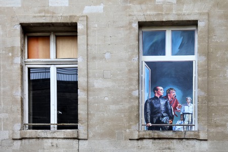 AVIGNON, FRANCE - JULY 1, 2014: Windows in an old mansion in Avignon. Historic Centre of Avignon near Pope palace, the residence of the Popes in 1309-1377. July 1, 2014 Avignon.のeditorial素材