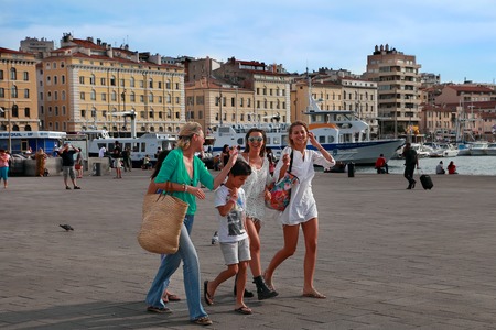 MARSEILLE - JULY 2, 2014: Old port (Vieux-Port) with people walking along the promenade on July 2, 2014, Marseille.のeditorial素材