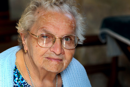 BURGUNDY, FRANCE - CIRCA AUGUST 2012:  Portrait of senior unidentified  woman.  Senior europien woman in glasses looking to you.のeditorial素材