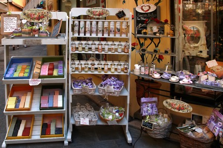 GRASSE, FRANCE - JULY 5: Homemade multi colored soap and another cosmetics and gifts in a street  of the city of Grasse  shop in France.のeditorial素材