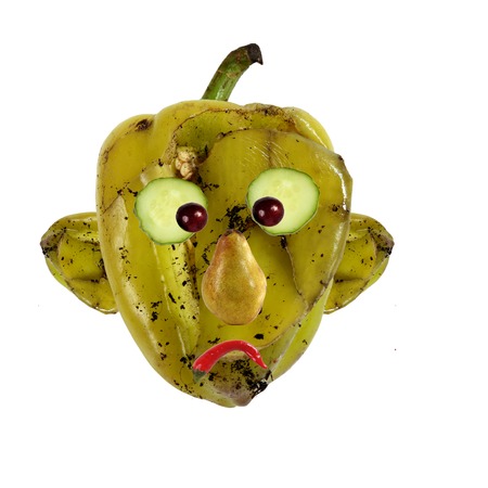Creative food concept. Negative portraits made of green spoiled  pepper.