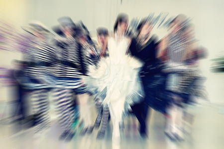 Abstract background - fashion models on catwalk - radial zoom blur effect defocusing filter applied,の写真素材