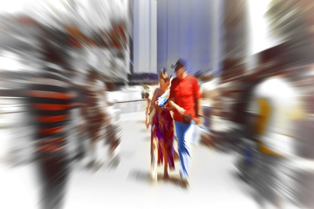 Abstract background. Pedestrians walking - rush hour in Barcelona, Spain.  Radial zoom blur effect defocusing filter appliedの写真素材