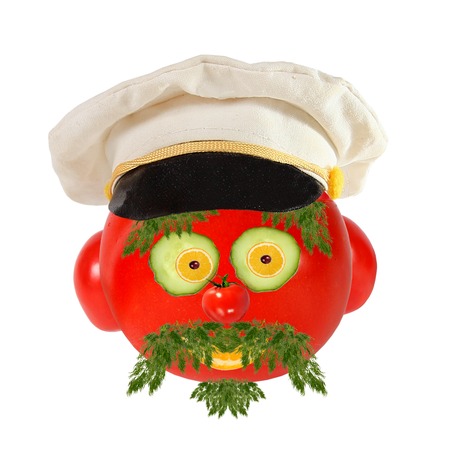 Creative food concept. Funny portrait of a sea captain made of  tomato , vegetables and fruit.の写真素材