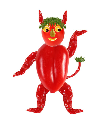 Creative food concept. Funny little  devil made of chili peppers