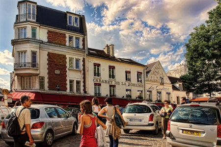 PARIS, FRANCE -  August 19, 2014. Tourists walking on Montmartre. More than 30 million people visit Paris every year. PARIS, FRANCE -  August 19, 2014.のeditorial素材