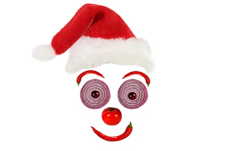 Creative food concept. Funny portrait of a Santa Claus made of fruits and vegetables.の写真素材