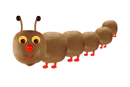Creative food concept. Funny little  caterpillar made from fruit and vegetablesの写真素材