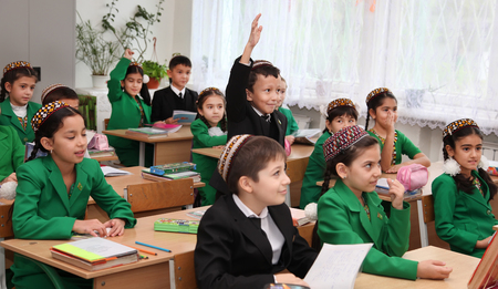 Ashgabad, Turkmenistan - November 4, 2014. Group of students in lesson in the classroom . November 4, 2014.  In schools of Turkmenistan annually trains about 900 thousand children.のeditorial素材