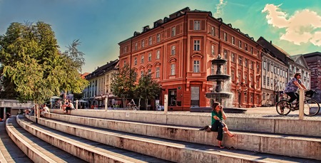 LJUBLJANA, SLOVENIA -  JULY 28, 2017: Old town embankment in Ljubljana. Ljubljana is the business and cultural center of the country.のeditorial素材