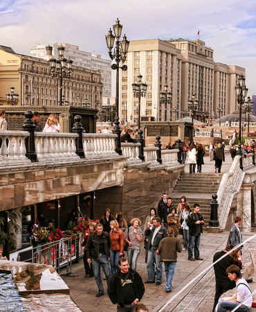 MOSCOW, RUSSIA - September 18, 2017:  People at the fountain on Manezhnaya Square. Cityscape of Manezhnaya square in city center of Moscow, Russia. There is the famous shopping center Okhotny Ryad.のeditorial素材