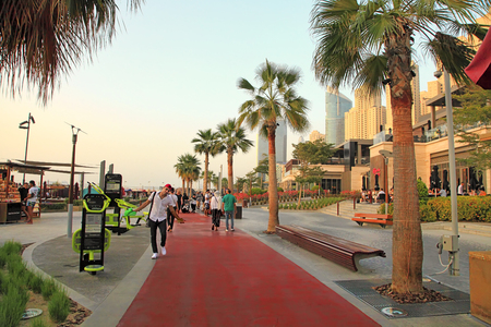 Dubai, UAE - May 08, 2018: Dubai Marina promenade at sunset. .Dubai marina skyscrapers view, Dubai, United Arab Emirates.  Dubai Marina is a district in Dubai with artificial canal city, it accommodates more than 120,000 people.  Dubai, UAE. -May 08, 2018のeditorial素材