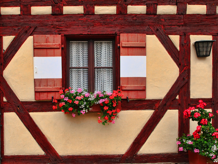 Window decorated with fresh flower in Nurembergの写真素材