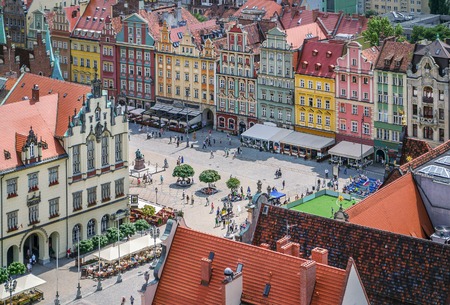 People walking on the market square in Wroclaw, Poland. Top view.のeditorial素材