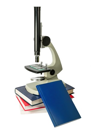 microscope and books isolated on white backgroundの写真素材