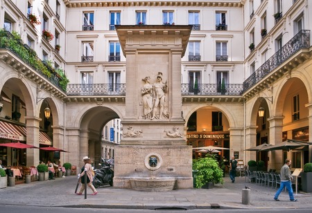 PARIS - September 08: people walk and relax in a cafe near the fountain of Mars in Paris, France on September 08, 2013.  Paris is the most visited city in the world.のeditorial素材