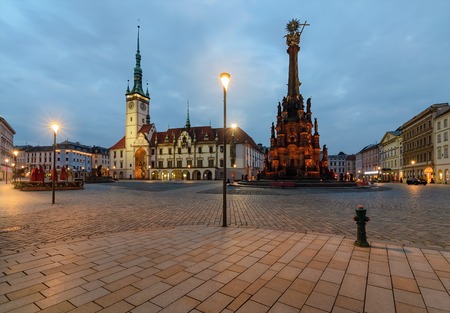 Town hall and Holy Trinity Column in the main square of the old town of Olomouc, Czech Republic in...