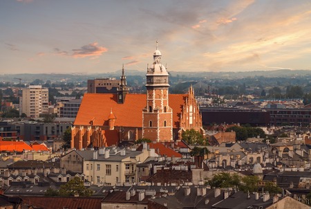 Roofs and the church in sunset light. Krakow, Poland.の写真素材
