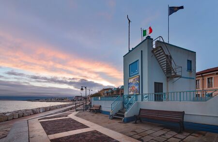 Colorfull embankment in Caorle after sunset. Europe. Italy.
