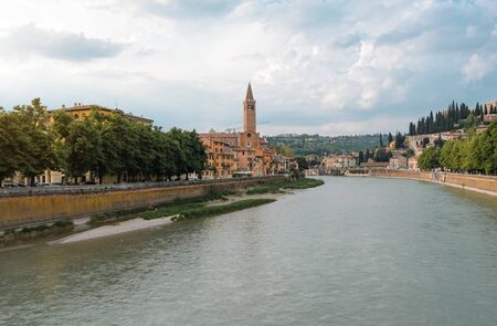 Panoramic view on the dige river in the evening in Verona. Italyの写真素材