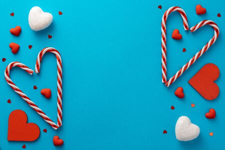 Valentine's Day background. hearts, candys on aqua menthe background. Valentines day concept. Flat lay, top view, copy spaceの写真素材
