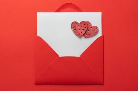 valentines day card love letter card background. Hearts, candys, Flat lay, top view, copy space. Lush lava trend 2020 color.の写真素材