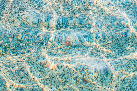 Abstract nature water pebbles background. Blue pebbles texture. Stone background. Blue vintage color. Sea peblles beach. Beautiful nature. Turquoise colorの写真素材