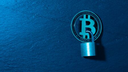 Bitcoin security concept. Cryptocurrency protection symbol. Flat lay, top view, copy space. Neon light.の写真素材