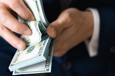 Business, counting money, success concept. Symbol of success and wealth.