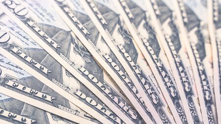 Background of 50 dollar bills. Image with high resolution and soft focusの写真素材