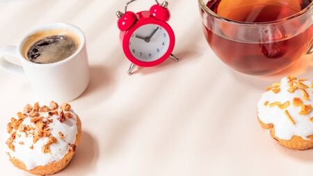 Dessert tea and coffee with Muffins on light table. Close up, Copy space.の写真素材