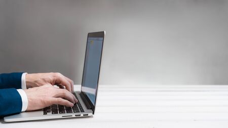 Man working concept with copy space. workspace concept, Laptop on white table.