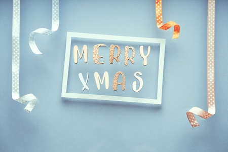 Merry Christmas minimal pastel greeting card , frame, banner with holidays decorations.の写真素材