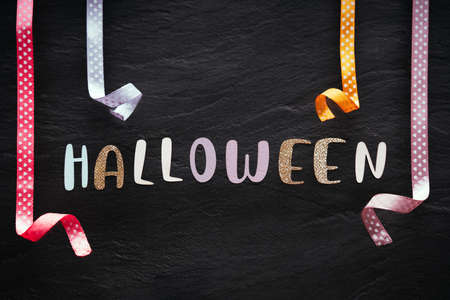 The word halloween on minimal pastel greeting card , frame, banner.の写真素材