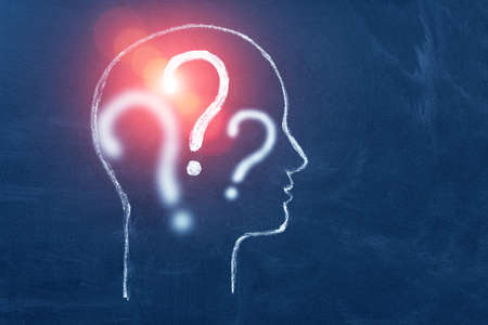 Human head with question mark symbol. Concept of education and choice, anonymous and suspect. Copy space.の写真素材