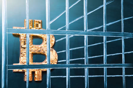 Bitcoin in prison. Concept of arrest, fraud and deception with cryptocurrency and mining. Bitcoin...