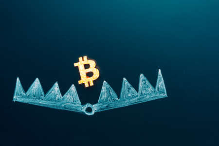 Trapped concept. Bitcoin as a bait. cryptocurrency into the bear trap. Investment risk or money trap, business fraud and cheating or financial pitfall and mistake conceptの写真素材